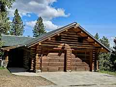 2 car garage attached to log home