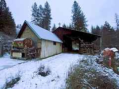 Drive through pole barn with attached enclosed outbuilding.