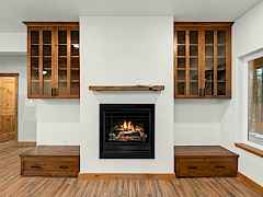 Lower level gas fireplace produces 50,000 BTU's